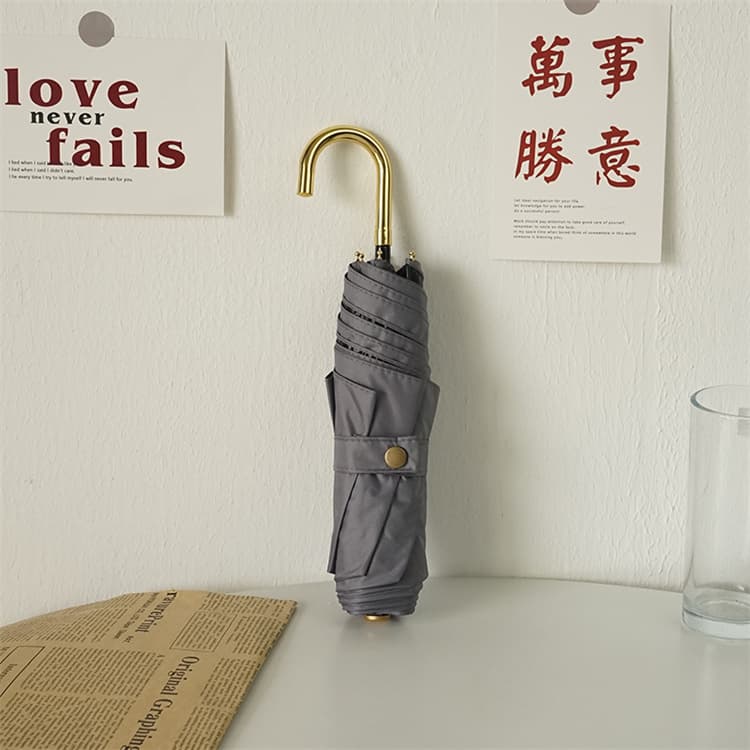 上品な金色ハンドル折りたたみ傘晴雨兼用