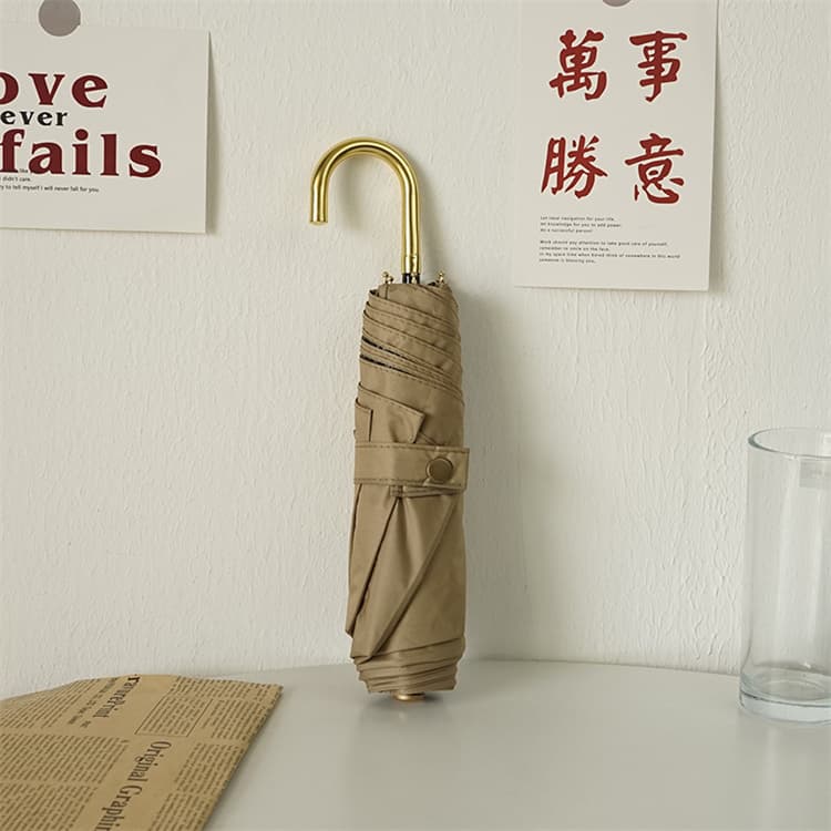 上品な金色ハンドル折りたたみ傘晴雨兼用